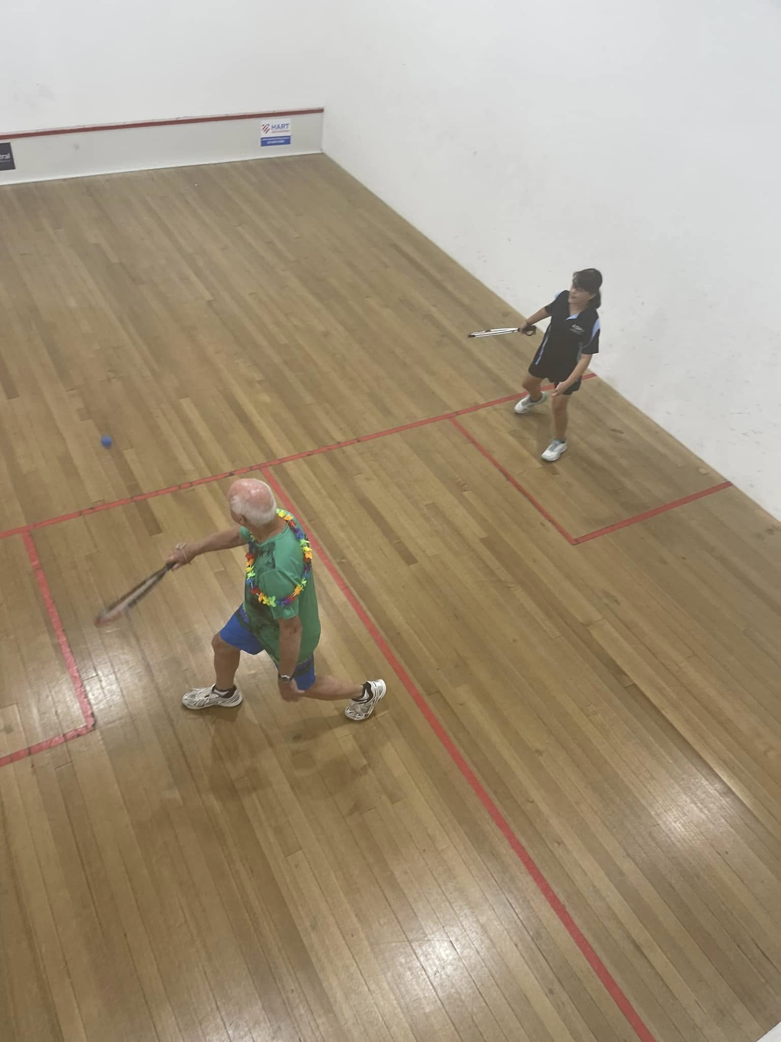Squash player lining up a shot